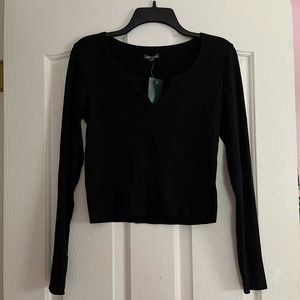 Black long sleeve shirt. Size: M. Brand: Wild Fable